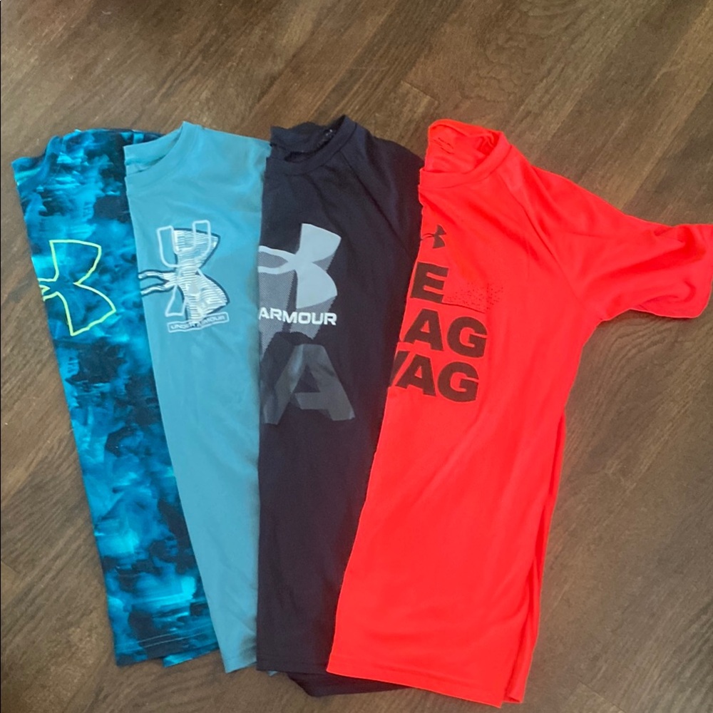 Like new Under Armour Blue and Black…Short Sleeve Tees Athletic Performance